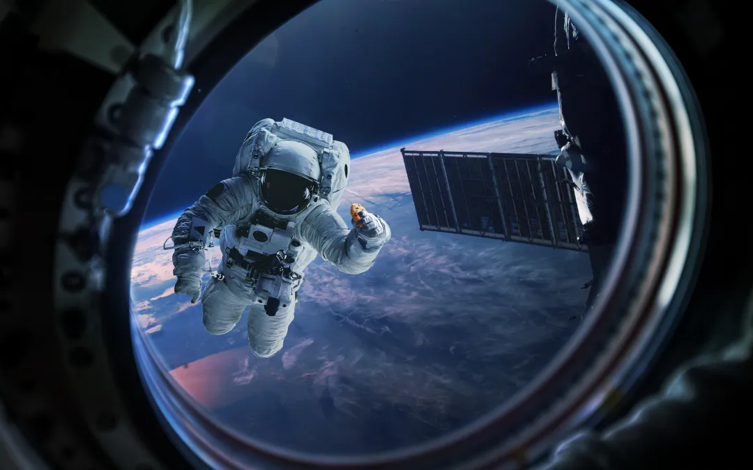 Astronaut floating above Earth during a spacewalk